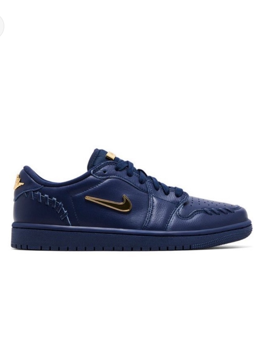 Nike Air Jordan 1 Low Midnight Navy with gold accents.